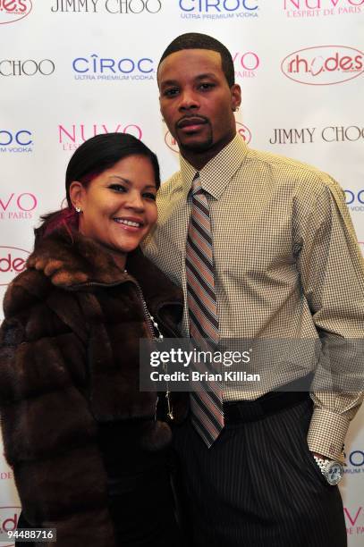 Stylist Misa Hyltona dn NY Jets safety Kerry Rhodes attend the holiday shopping mixer at the Jimmy Choo store in the Short Hills Mall on December 15,...