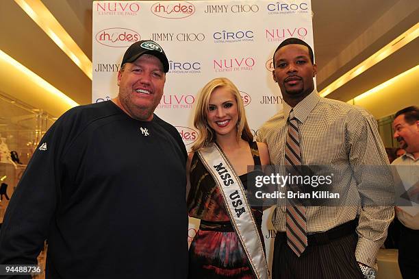 Jets head coach Rex Ryan, Miss USA Kristen Dalton, and NY Jets safety Kery Rhodes attend the holiday shopping mixer at the Jimmy Choo store in the...