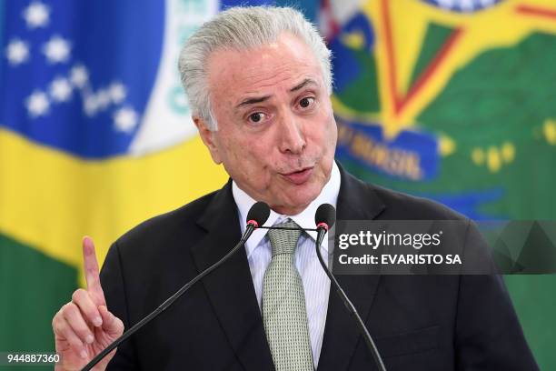 Brazilian President Michel Temer delivers a speech during the presentation ceremony for promoted general officers at the Planalto Palace in Brasilia...