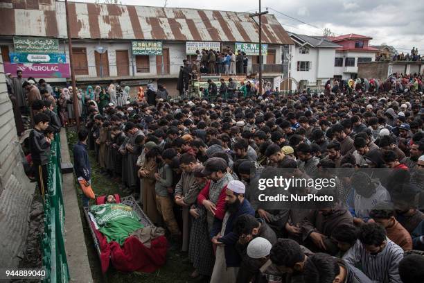 Kashmiri civilians offer funeral prayers to Sharjeel Sheikh, a civilian who was shot dead by Indian government forces during clashes near the...