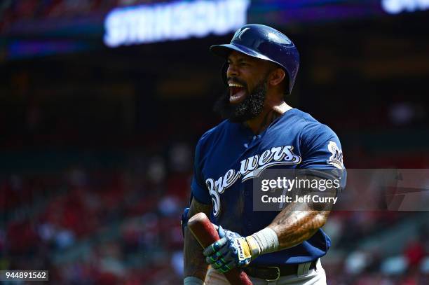 Eric Thames of the Milwaukee Brewers reacts after striking out during the eighth inning against the St. Louis Cardinals at Busch Stadium on April 11,...