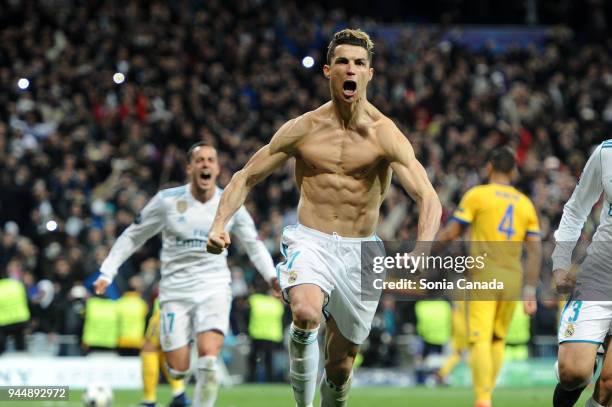Cristiano Ronaldo, #7 of Real Madrid celebrates after scoring his team's first goal during the UEFA Champions League Quarter Final Leg Two between...