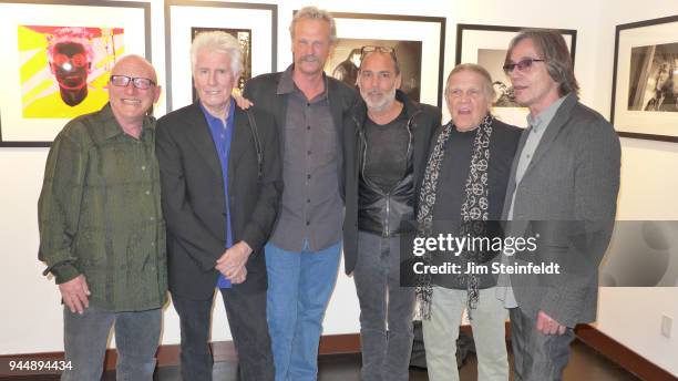 Graham Nash and friends pose for a portrait at the Leica Gallery in Los Angeles, California on April 17, 2013.