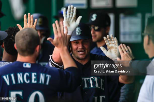 Kyle Seager of the Seattle Mariners celebrates hitting a two-run home run against the Kansas City Royals during the eighth inning at Kauffman Stadium...