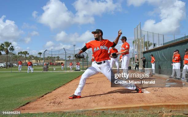 Miami Marlins pitcher Jarlin Garcia pitches during the spring training baseball workouts for pitchers and catchers on Wednesday, February 14, 2018 at...