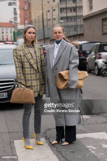 Stylist, Co founder and creative director at Social Zoo Pernille Teisbaek wears Balenciaga shoes and bag, Levi's jeans, Dries Van Noten jacket,...