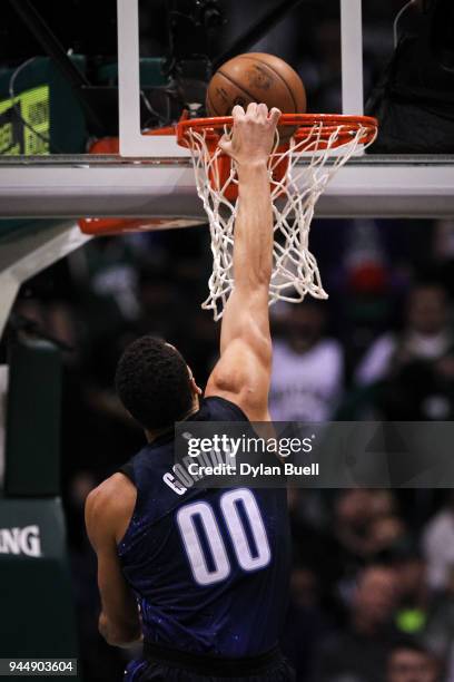Aaron Gordon of the Orlando Magic dunks the ball in the first quarter against the Milwaukee Bucks at the Bradley Center on April 9, 2018 in...