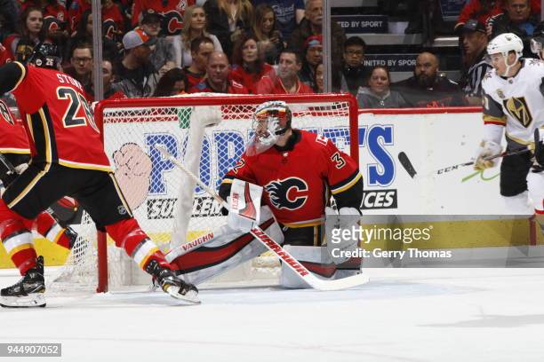 Jon Gillies of the Calgary Flames plays against the Vegas Golden Knights during an NHL game on April 7, 2018 at the Scotiabank Saddledome in Calgary,...
