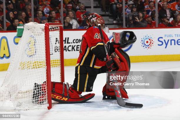 Mike Smith of the Calgary Flames plays against the Edmonton Oilers during an NHL game on March 31, 2018 at the Scotiabank Saddledome in Calgary,...