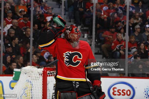 Mike Smith of the Calgary Flames skates against the Edmonton Oilers during an NHL game on March 31, 2018 at the Scotiabank Saddledome in Calgary,...