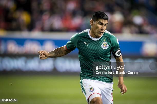 Captain Carlos Salcido of Guadalajara clears the ball during the CONCACAF Champions League - Semifinals - Leg 2 match between CD Guadalajara and New...