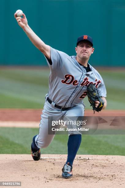 Starting pitcher Jordan Zimmermann of the Detroit Tigers pitches during the first inning moments before he was hit in the head by a line drive off...