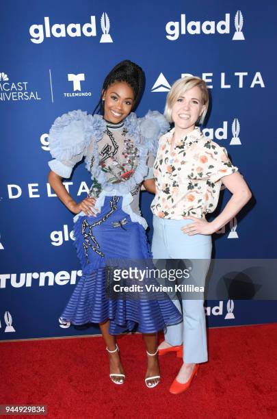 Nafessa Williams and Hannah Hart attend Rising Stars at the GLAAD Media Awards Los Angeles at The Beverly Hilton Hotel on April 11, 2018 in Beverly...