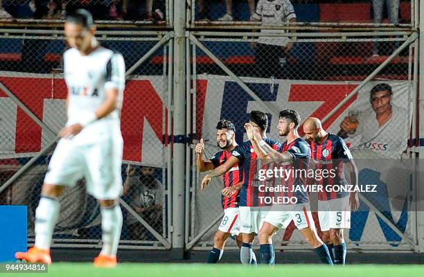 Argentina's San Lorenzo players celebrate after scoring a goal against Brazil's Atletico Mineiro during their Copa Sudamericana first stage first leg...