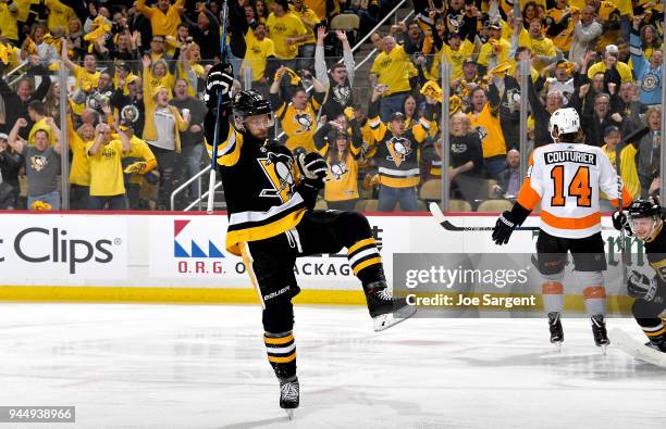 Bryan Rust of the Pittsburgh Penguins celebrates his first period goal against the Philadelphia Flyers in Game One of the Eastern Conference First...