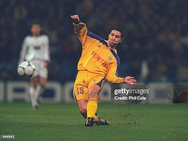 Besnik Hasi of Anderlecht passes the ball during the UEFA Champions League Group D match against Real Madrid played at the Bernabeau, in Madrid,...