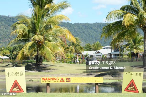 Port Douglas golf course with crocodile warning on August 09, 2013 in Port Douglas, Queensland, Australia. With thousands of visitors to Queensland...