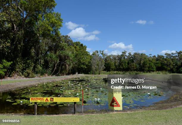 Port Douglas golf course with crocodile warning on August 09, 2013 in Port Douglas, Queensland, Australia. With thousands of visitors to Queensland...