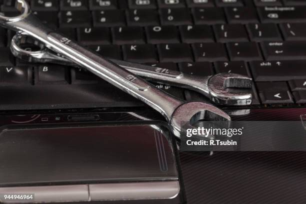 wrench tool and screwdrivers - touchpad stock pictures, royalty-free photos & images