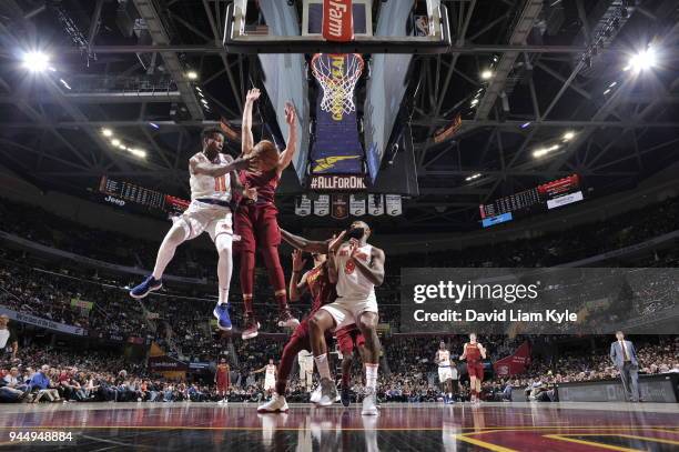 Frank Ntilikina of the New York Knicks handles the ball against the Cleveland Cavaliers on April 11, 2018 at Quicken Loans Arena in Cleveland, Ohio....