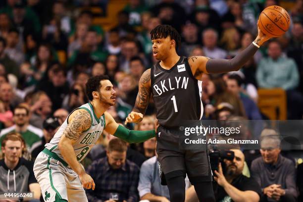 Angelo Russell of the Brooklyn Nets looks to pass the ball while guarded by Shane Larkin of the Boston Celtics during a game at TD Garden on April...