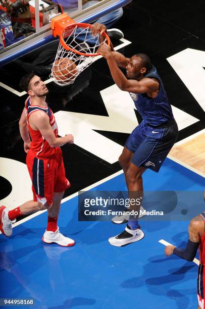 Bismack Biyombo of the Orlando Magic dunks the ball against the Washington Wizards on April 11 2018 at Amway Center in Orlando, Florida. NOTE TO...