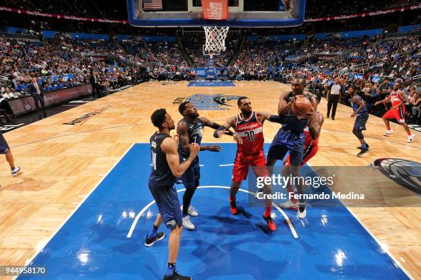 Bismack Biyombo of the Orlando Magic handles the ball against the Washington Wizards on April 11 2018 at Amway Center in Orlando, Florida. NOTE TO...