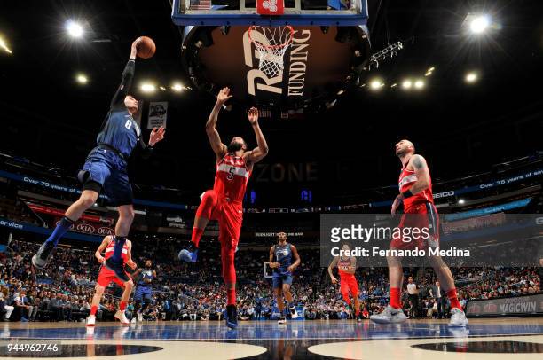 Nikola Vucevic of the Orlando Magic goes to the basket against the Washington Wizards on April 11 2018 at Amway Center in Orlando, Florida. NOTE TO...