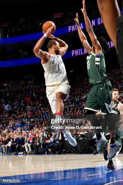 Justin Anderson of the Philadelphia 76ers passes the ball during the game against the Milwaukee Bucks on April 11, 2018 in Philadelphia, Pennsylvania...