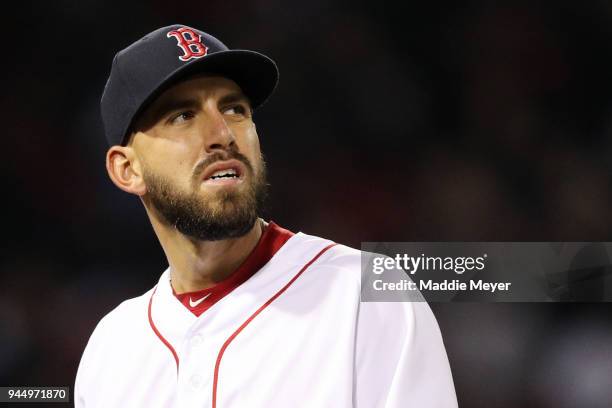 Matt Barnes of the Boston Red Sox reacts after allowing two runs during the sixth inning against the New York Yankees at Fenway Park on April 11,...