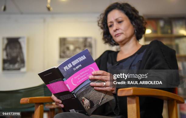 Colombian writer Pilar Quintana offers an interview to AFP in Bogota on February 24, 2018. - Only when she feared for her life did Pilar Quintana...