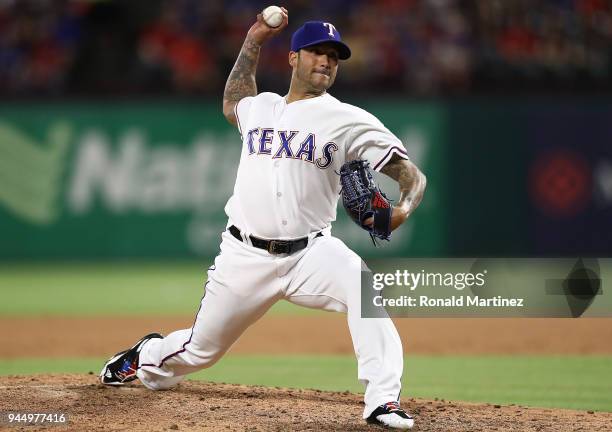 Matt Bush of the Texas Rangers throws against the Los Angeles Angels in the sixth inning at Globe Life Park in Arlington on April 11, 2018 in...