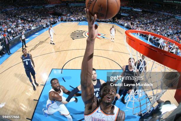 Jerami Grant of the Oklahoma City Thunder drives to the basket during the game against the Memphis Grizzlies on April 11, 2018 at Chesapeake Energy...