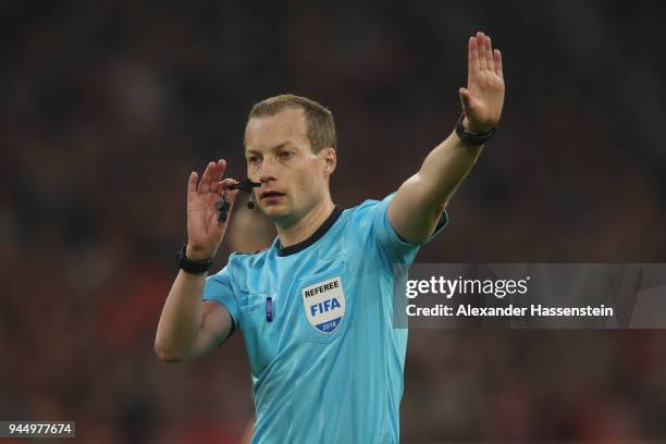 Referee William Collum reacts during the UEFA Champions League Quarter Final Second Leg match between Bayern Muenchen and Sevilla FC at Allianz Arena...