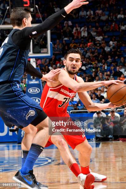 Tomas Satoransky of the Washington Wizards passes the ball against the Orlando Magic on April 11 2018 at Amway Center in Orlando, Florida. NOTE TO...