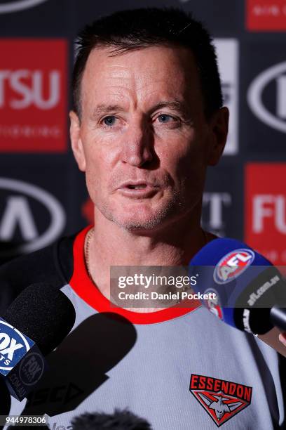 Bombers head coach John Worsfold talks to the media during an Essendon Bombers AFL training session at the Essendon Football Club on April 12, 2018...