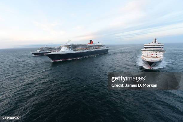 Cruise ship company Cunard execute a photo shoot with all three of its ships, Queen Mary 2 and Queen Elizabeth and Queen Victoria either side on May...