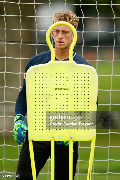 Victory goalkeeper Lawrence Thomas takes part during a Melbourne Victory A-League training session at Gosch's Paddock on April 12, 2018 in Melbourne,...