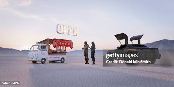 dystopian futures: fast food truck open for business as two potential customers arriving in their road warrior car discuss order. - road warrior foto e immagini stock