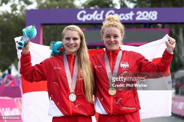 Silver medalist Evie Richards of England and gold medalist Annie Last of England pose during the medal ceremony for the Women's Cross-country on day...
