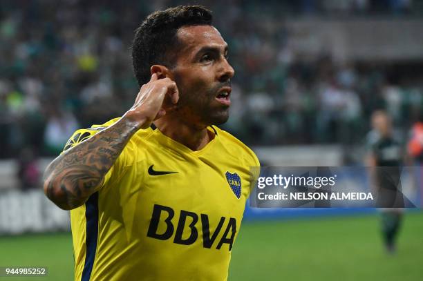 Carlos Tevez of Argentina's Boca Juniors celebrates after scoring a goal against Brazil's Palmeiras during a 2018 Copa Libertadores football match at...