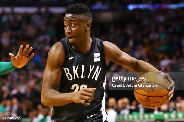 Caris LeVert of the Brooklyn Nets dribbles the ball during a game against the Boston Celtics at TD Garden on April 11, 2018 in Boston, Massachusetts....