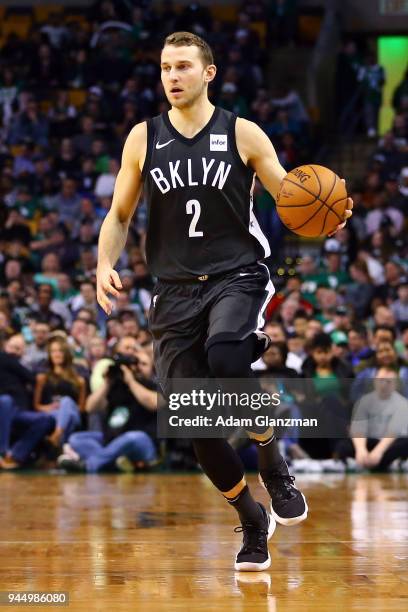 Nik Stauskas of the Brooklyn Nets dribbles the ball during a game against the Boston Celtics at TD Garden on April 11, 2018 in Boston, Massachusetts....