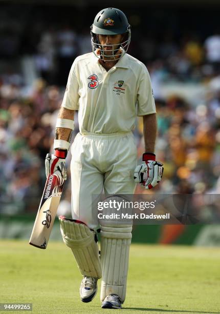 Simon Katich of Australia leaves the ground after being dismissed by Sulieman Benn of the West Indies for 99 runs during day one of the Third Test...