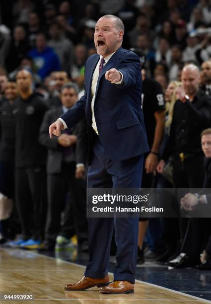 Head coach Michael Malone of the Denver Nuggets reacts during overtime of the game against the Minnesota Timberwolves on April 11, 2018 at the Target...