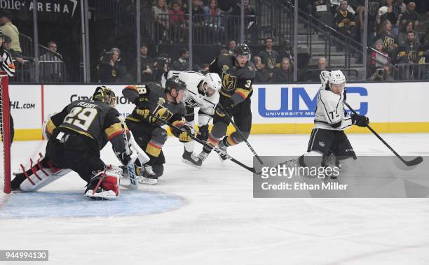 Marc-Andre Fleury and Nate Schmidt of the Vegas Golden Knights, Tobias Rieder of the Los Angeles Kings, Brayden McNabb of the Golden Knights and...