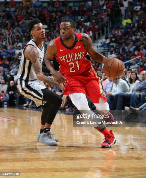 Darius Miller of the New Orleans Pelicans handles the ball against the San Antonio Spurs on April 11, 2018 at Smoothie King Center in New Orleans,...