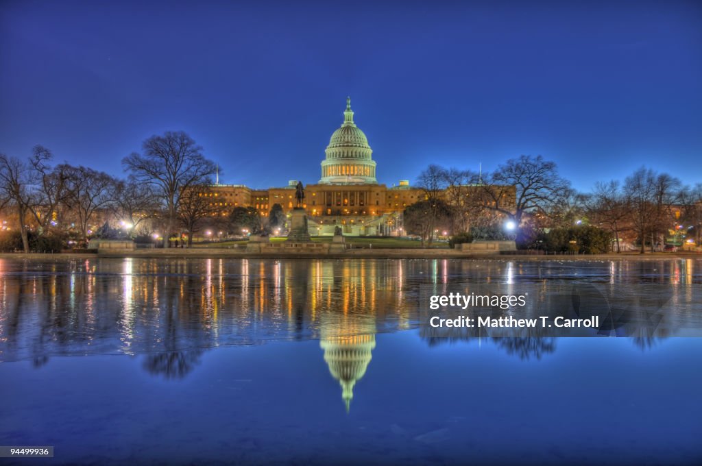 Capitol Building reflecting in lake