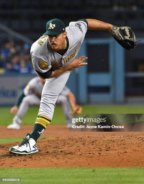 Daniel Mengden of the Oakland Athletics pitches in the third inning of the game against the Los Angeles Dodgers at Dodger Stadium on April 11, 2018...