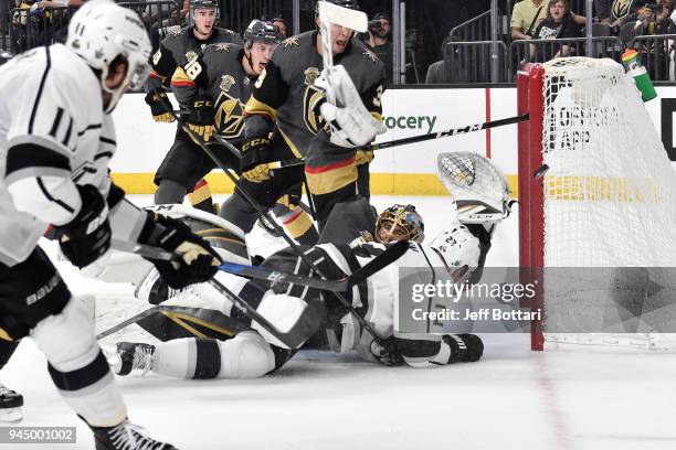 Dustin Brown of the Los Angeles Kings is called for a goalie interference penalty against Marc-Andre Fleury of the Vegas Golden Knights in Game One...